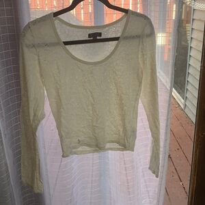 Cream long sleeve knit still top